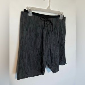 Lululemon Board Shorts Mens 32 Gray Black
Lined Swim Trunks Stretch 7" Beach